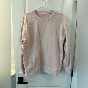 Size 6 lululemon pink crew neck hoodie.